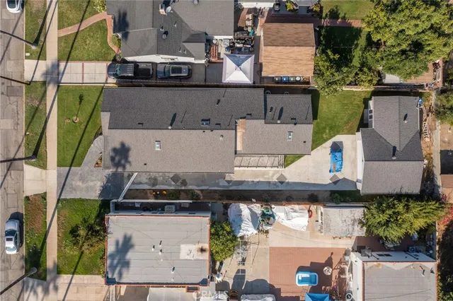 an aerial view of houses with outdoor space