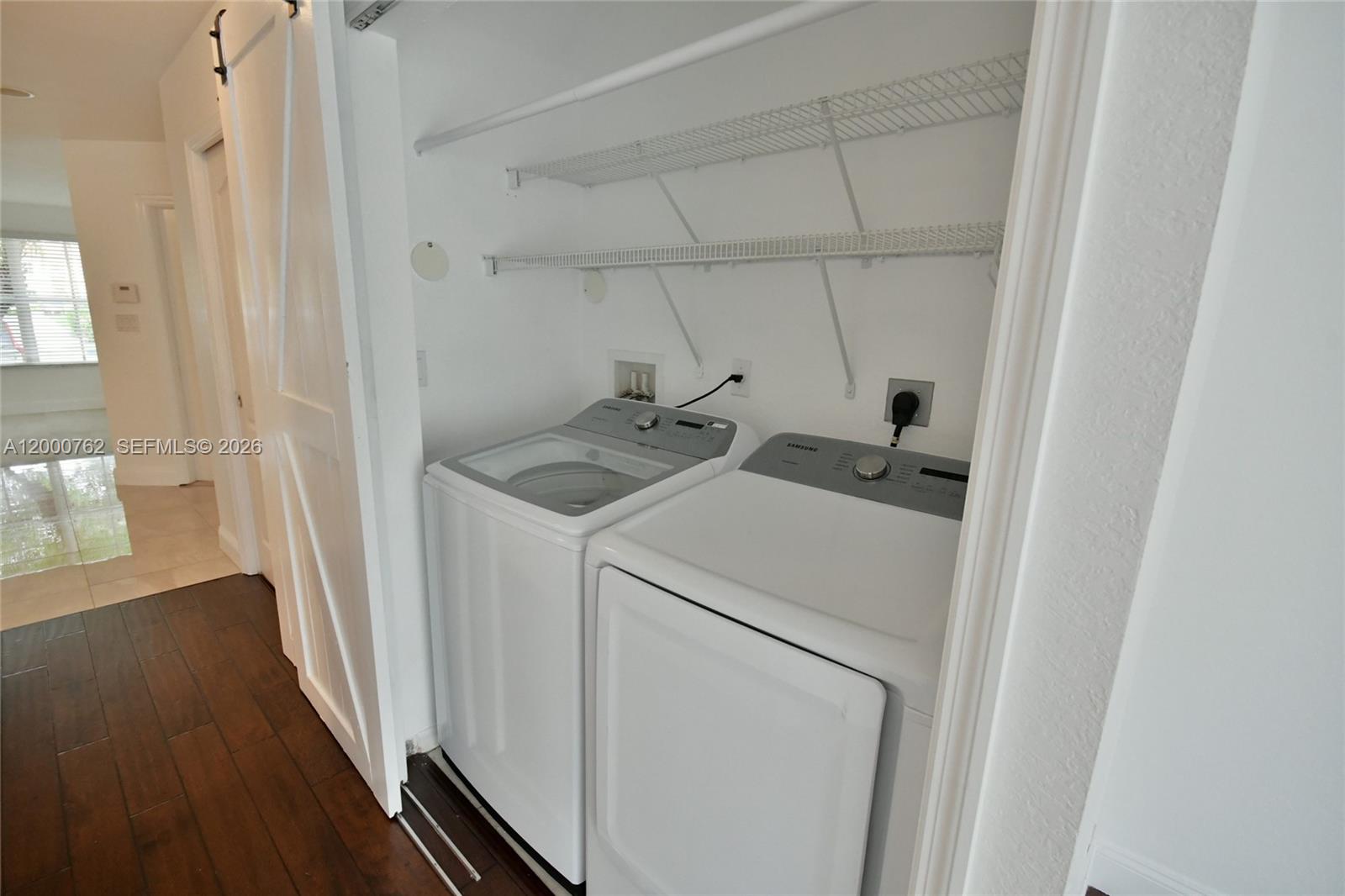 3177 Southwest 129th Way, Unit 134 Miramar, FL 33027 - Photo 14 of 34 a utility room with dryer and washer