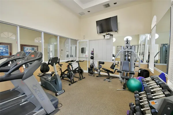 a view of a room with gym equipment