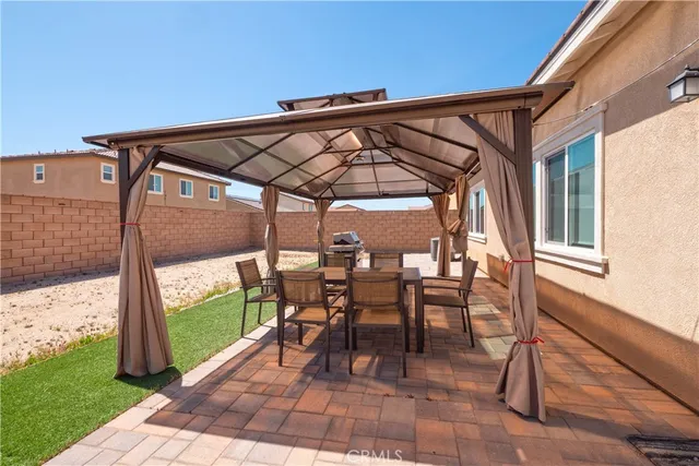 a house view with a wooden fence