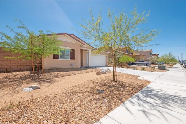 a house with a large tree in front of it