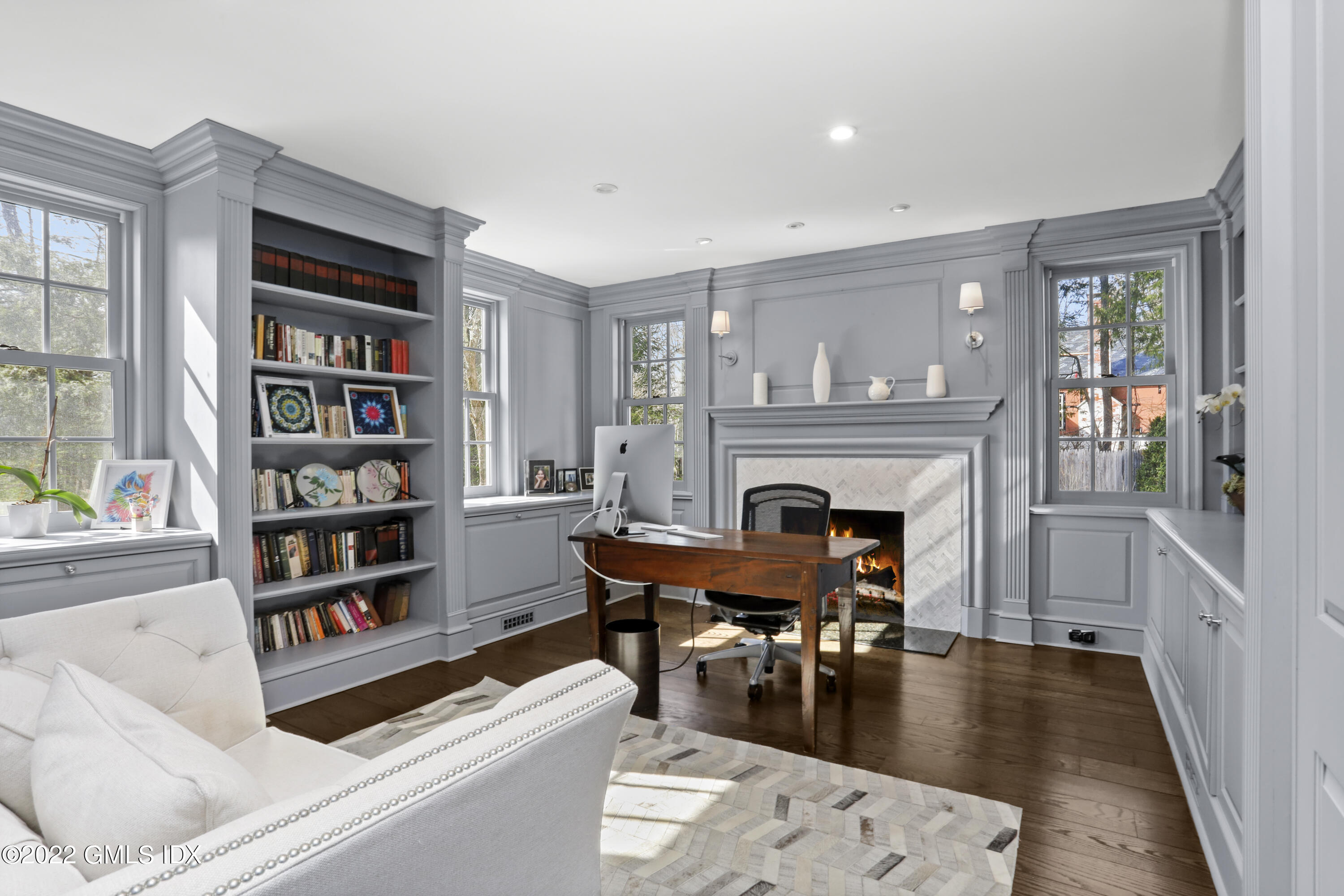 99 Husted Lane Greenwich, CT 06830 - Photo 11 of 27 a living room with furniture and a fireplace