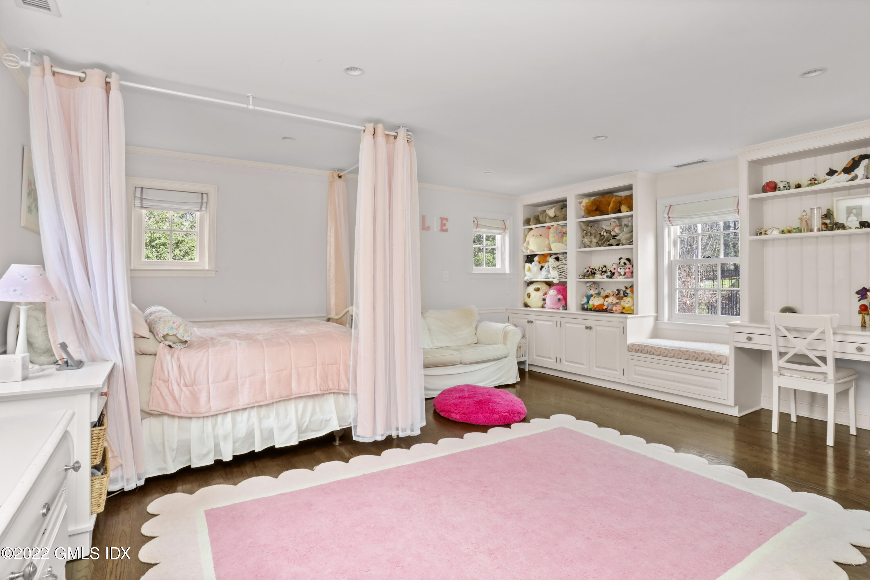 99 Husted Lane Greenwich, CT 06830 - Photo 17 of 27 a bed room with a bed and a window