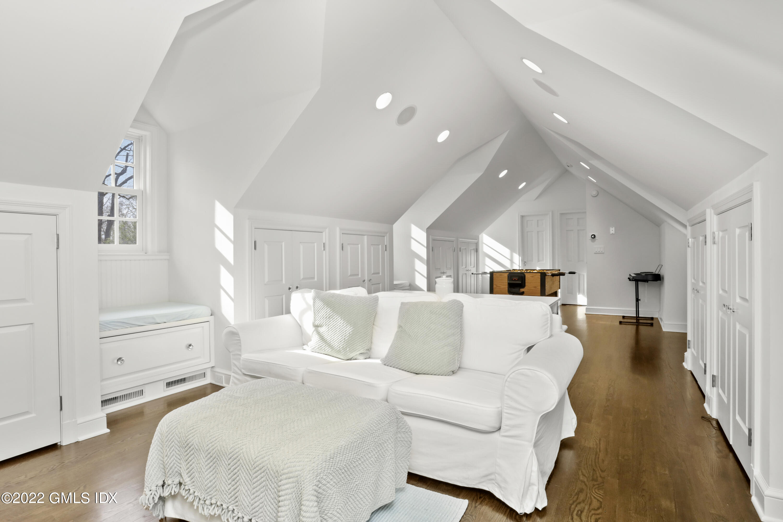 99 Husted Lane Greenwich, CT 06830 - Photo 18 of 27 a living room with furniture and a couch