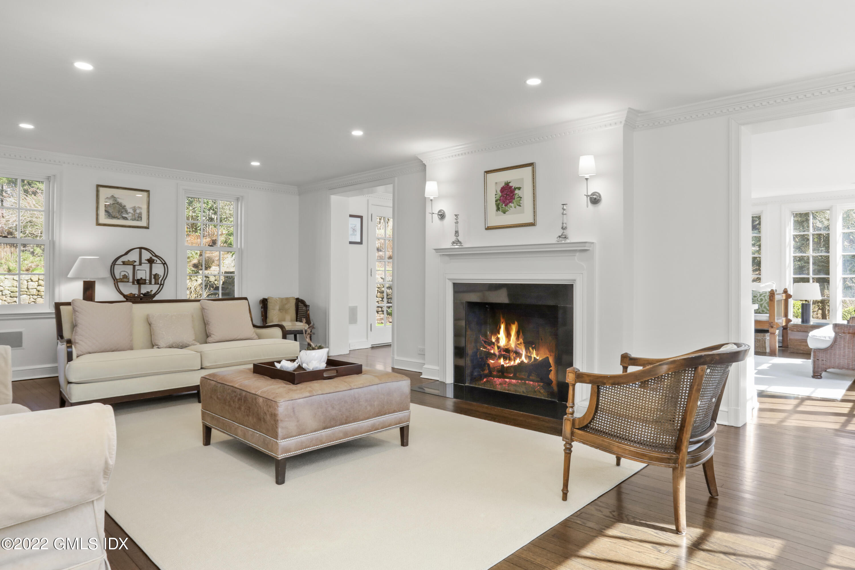 99 Husted Lane Greenwich, CT 06830 - Photo 5 of 27 a living room with furniture and a fireplace