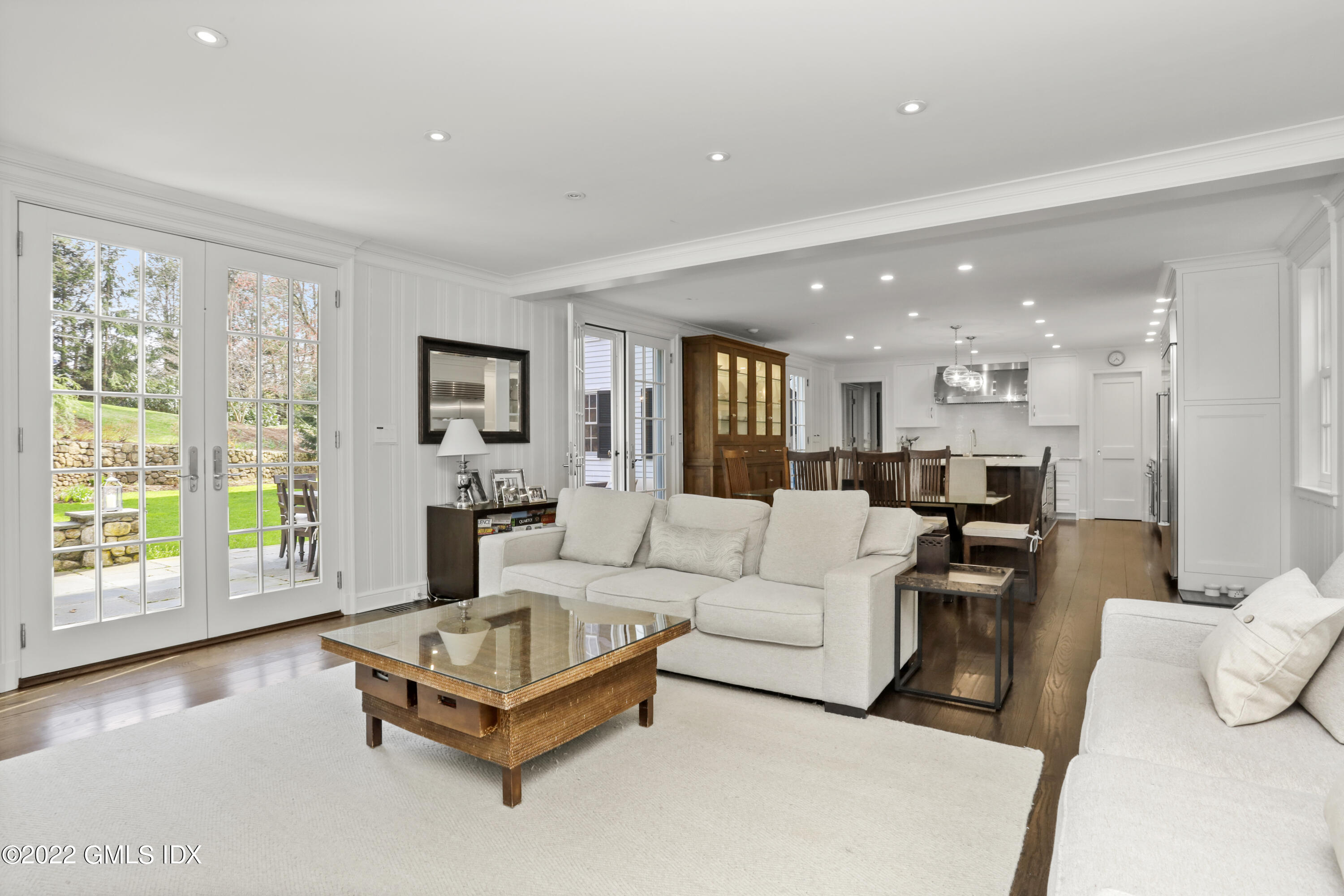 99 Husted Lane Greenwich, CT 06830 - Photo 10 of 27 a living room with furniture and a large window