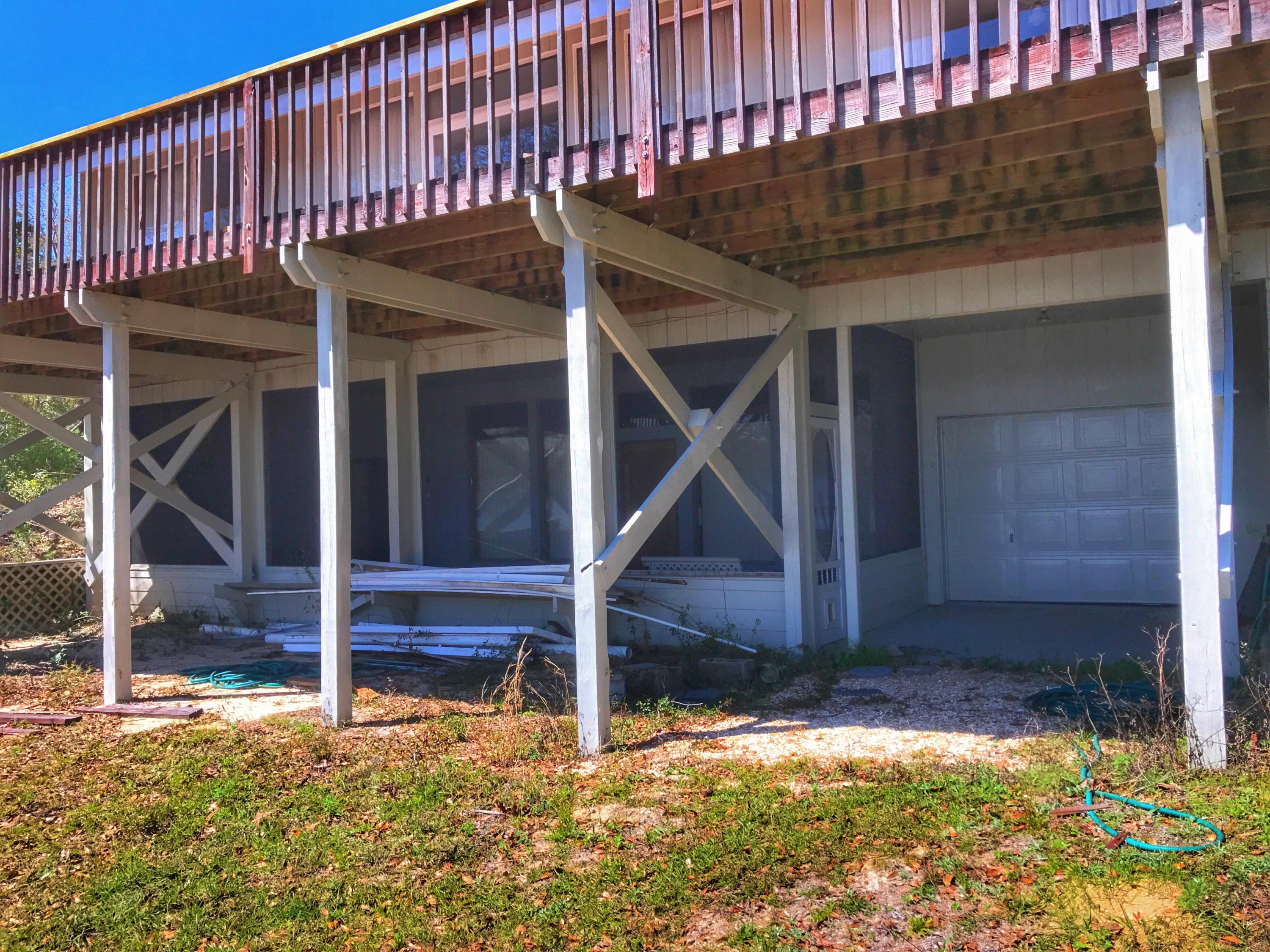 1326 Spring Lake Road DeFuniak Springs, FL 32433 - Photo 24 of 25 a view of a house with backyard