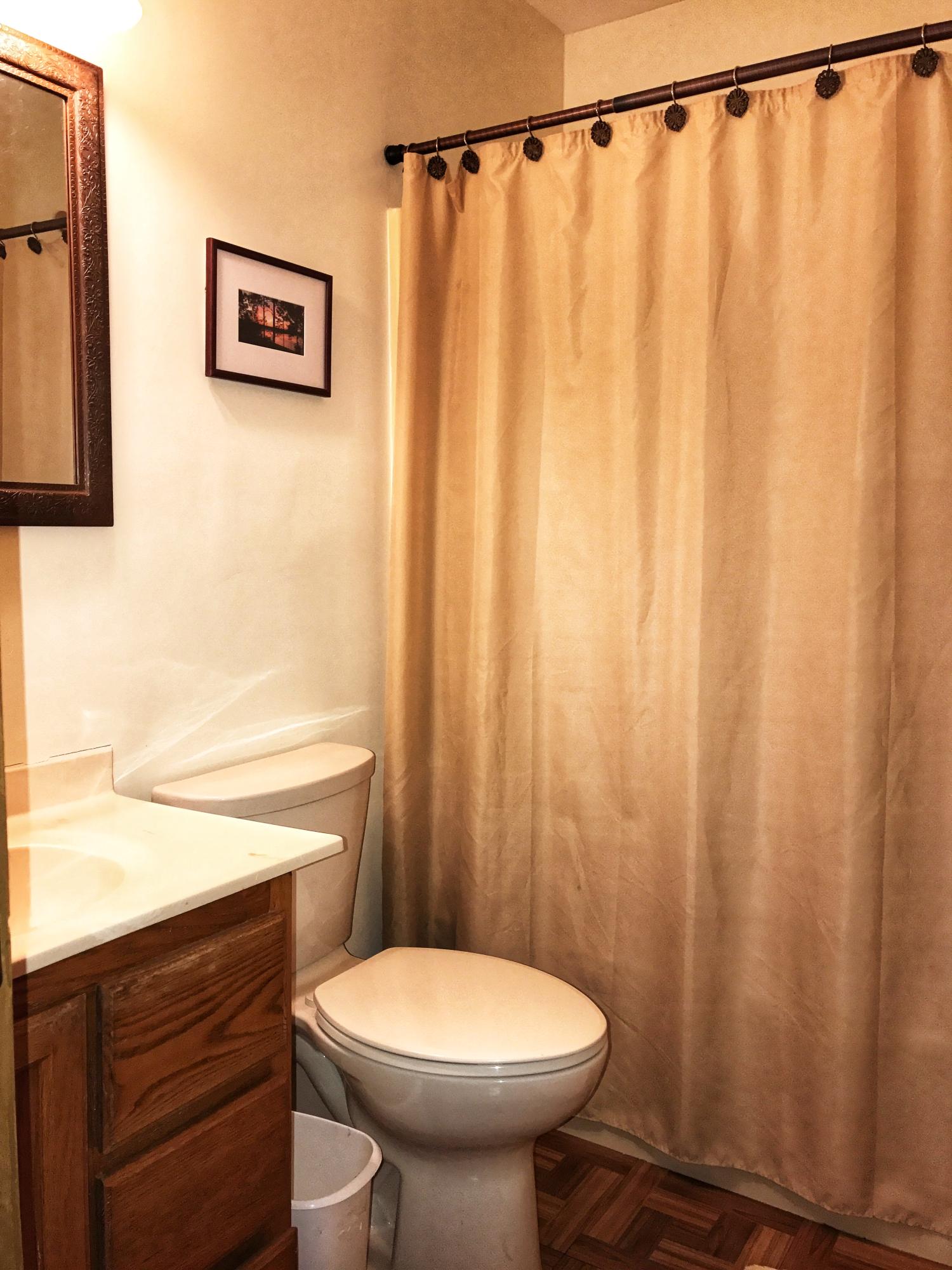1326 Spring Lake Road DeFuniak Springs, FL 32433 - Photo 5 of 25 a bathroom with a sink and a toilet