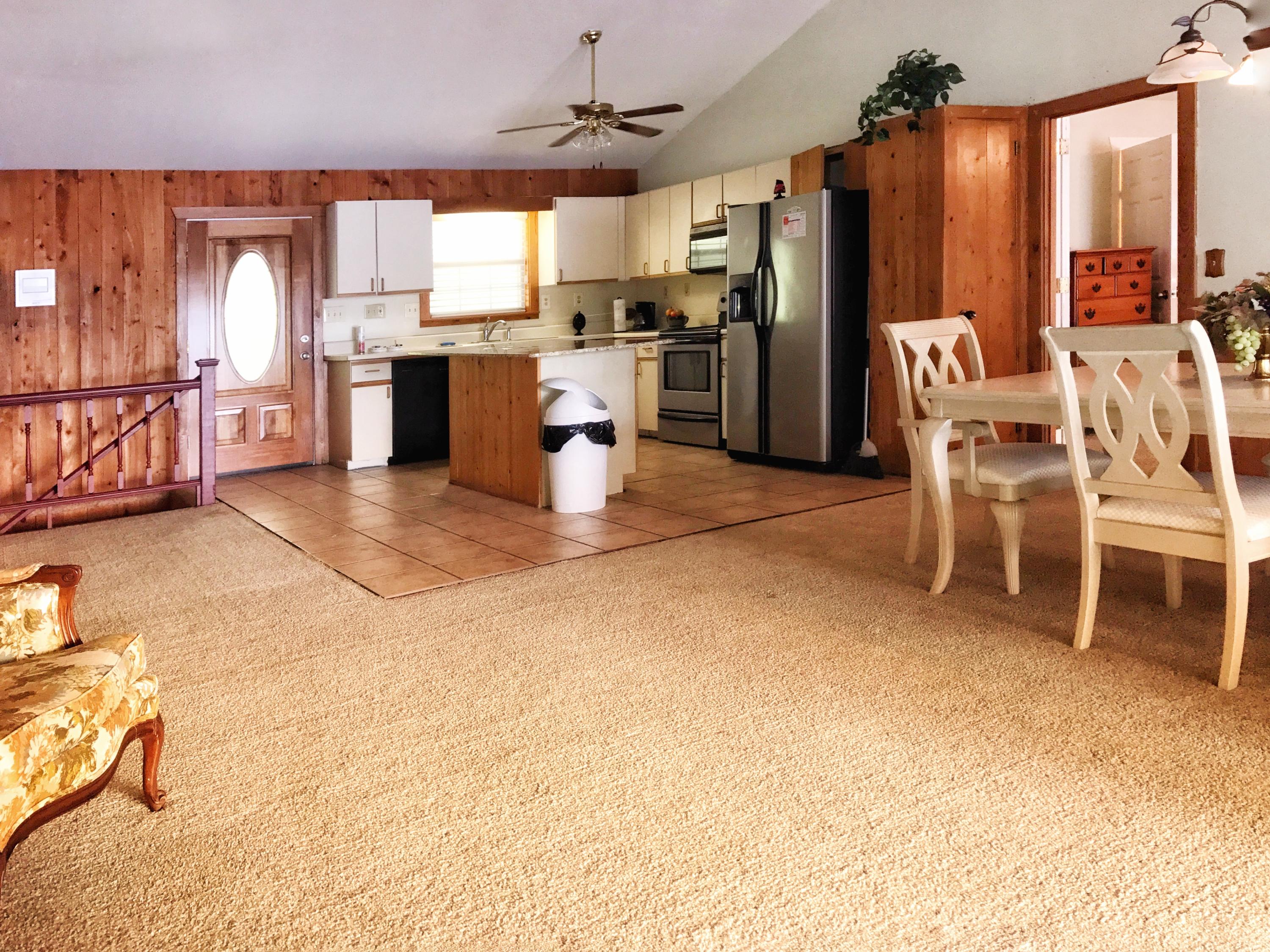 1326 Spring Lake Road DeFuniak Springs, FL 32433 - Photo 10 of 25 a view of kitchen with furniture and refrigerator