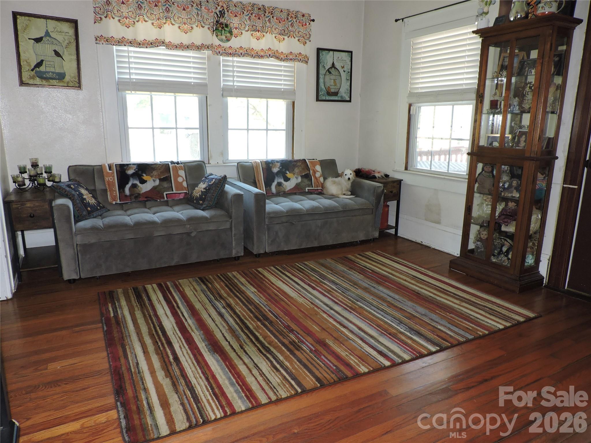 4 Carter Road Weaverville, NC 28787 - Photo 13 of 44 a living room with furniture and a window