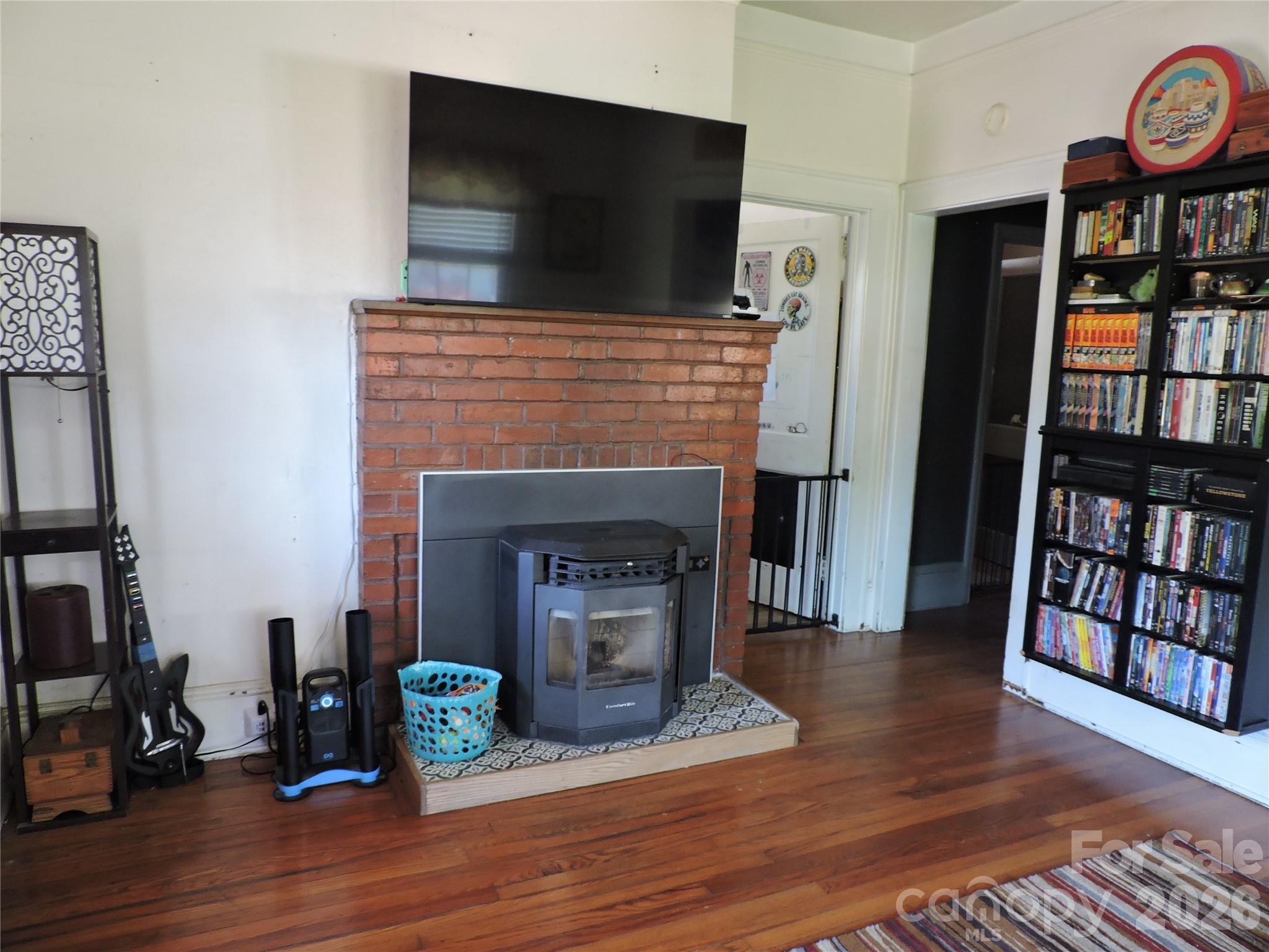 4 Carter Road Weaverville, NC 28787 - Photo 14 of 44 a living room with furniture and a fireplace