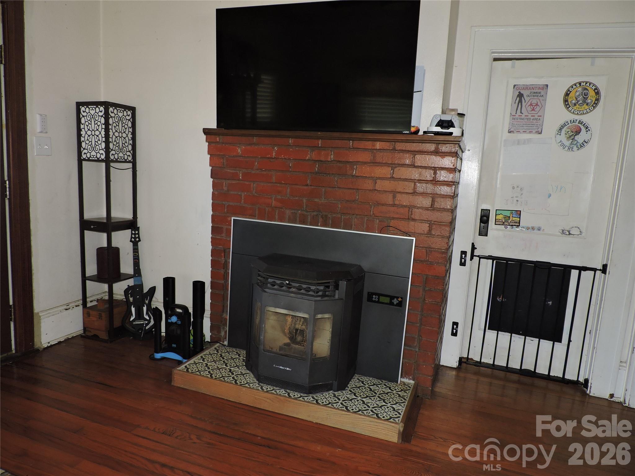 4 Carter Road Weaverville, NC 28787 - Photo 15 of 44 a living room with a fireplace