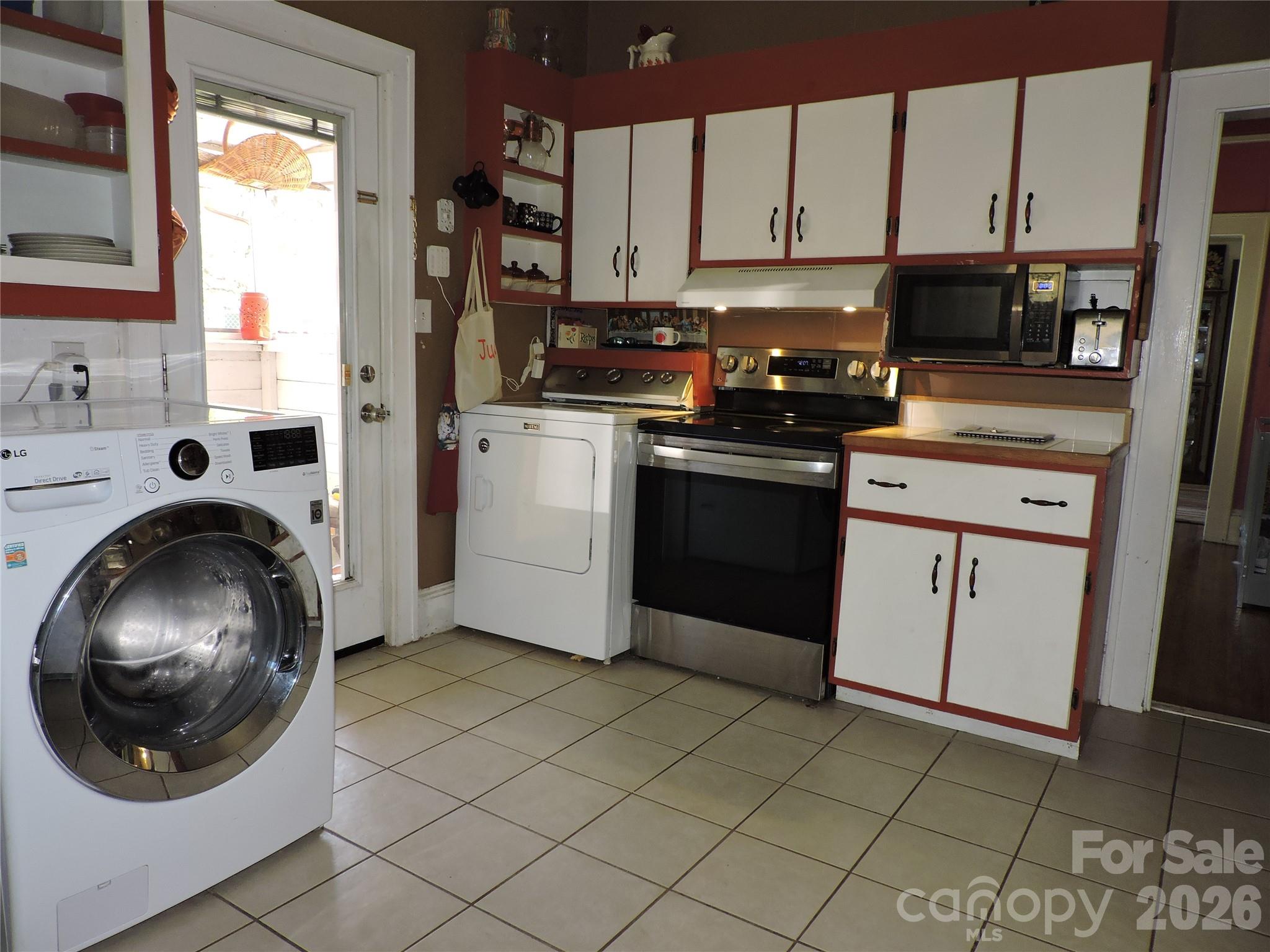 4 Carter Road Weaverville, NC 28787 - Photo 21 of 44 a kitchen with a sink and a stove top oven