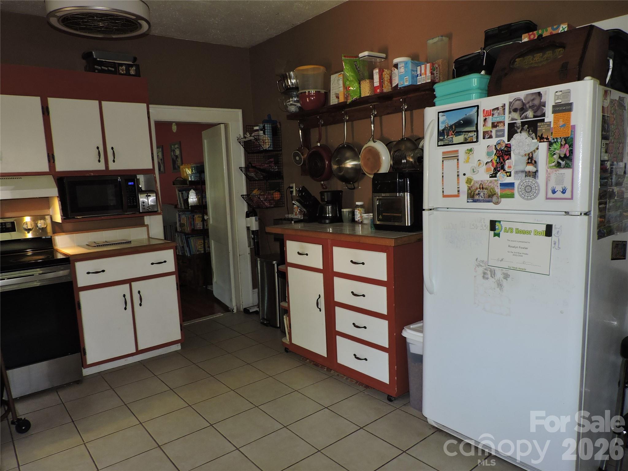 4 Carter Road Weaverville, NC 28787 - Photo 22 of 44 a kitchen with stainless steel appliances a refrigerator and cabinets