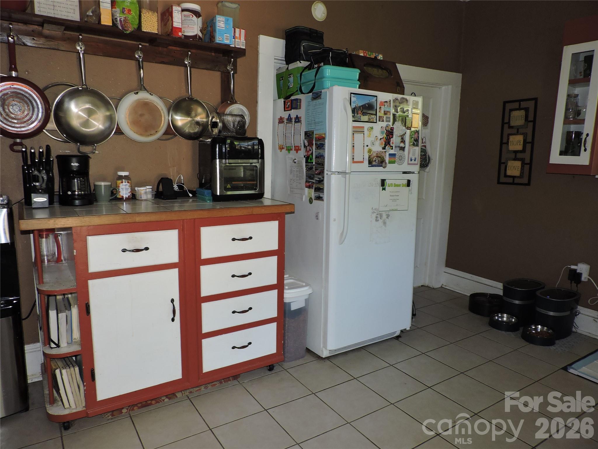 4 Carter Road Weaverville, NC 28787 - Photo 23 of 44 a kitchen with stainless steel appliances granite countertop a refrigerator and a stove