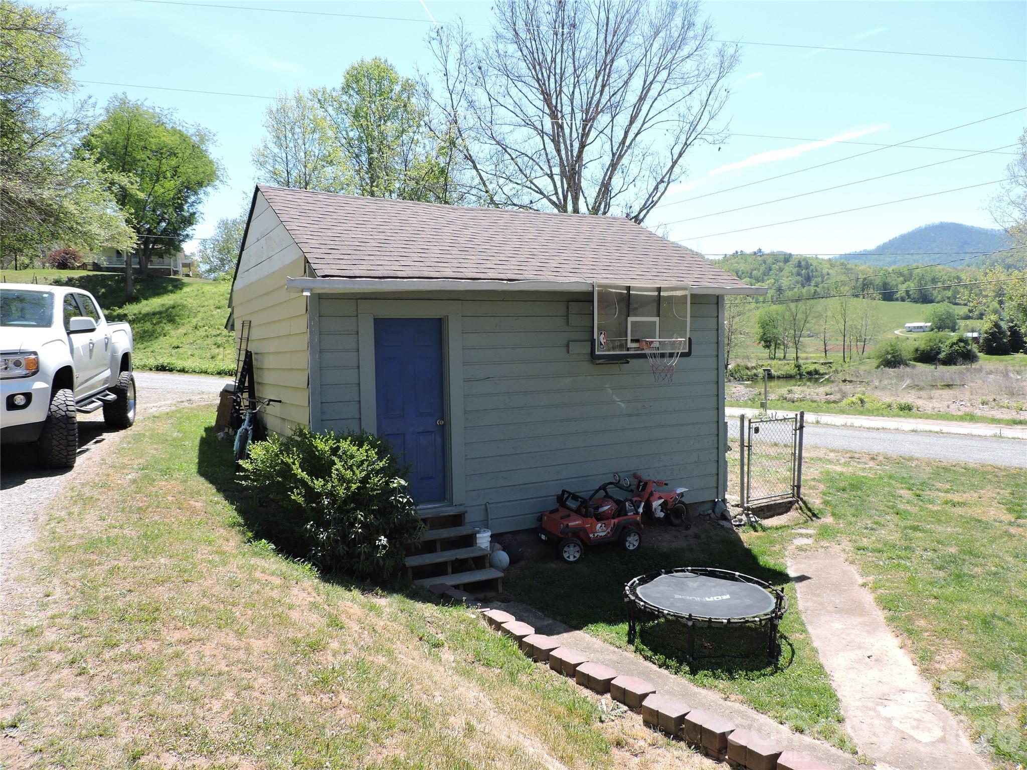 4 Carter Road Weaverville, NC 28787 - Photo 36 of 44 a view of a house with a yard
