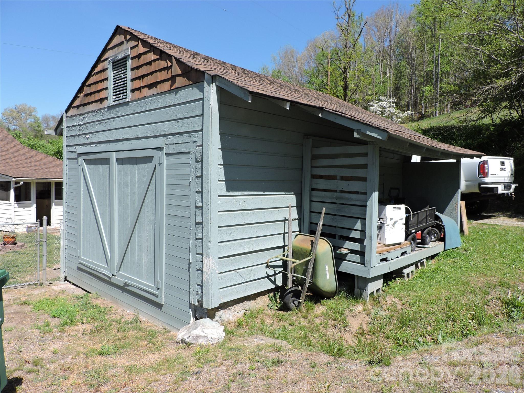 4 Carter Road Weaverville, NC 28787 - Photo 37 of 44 a view of a house with a yard