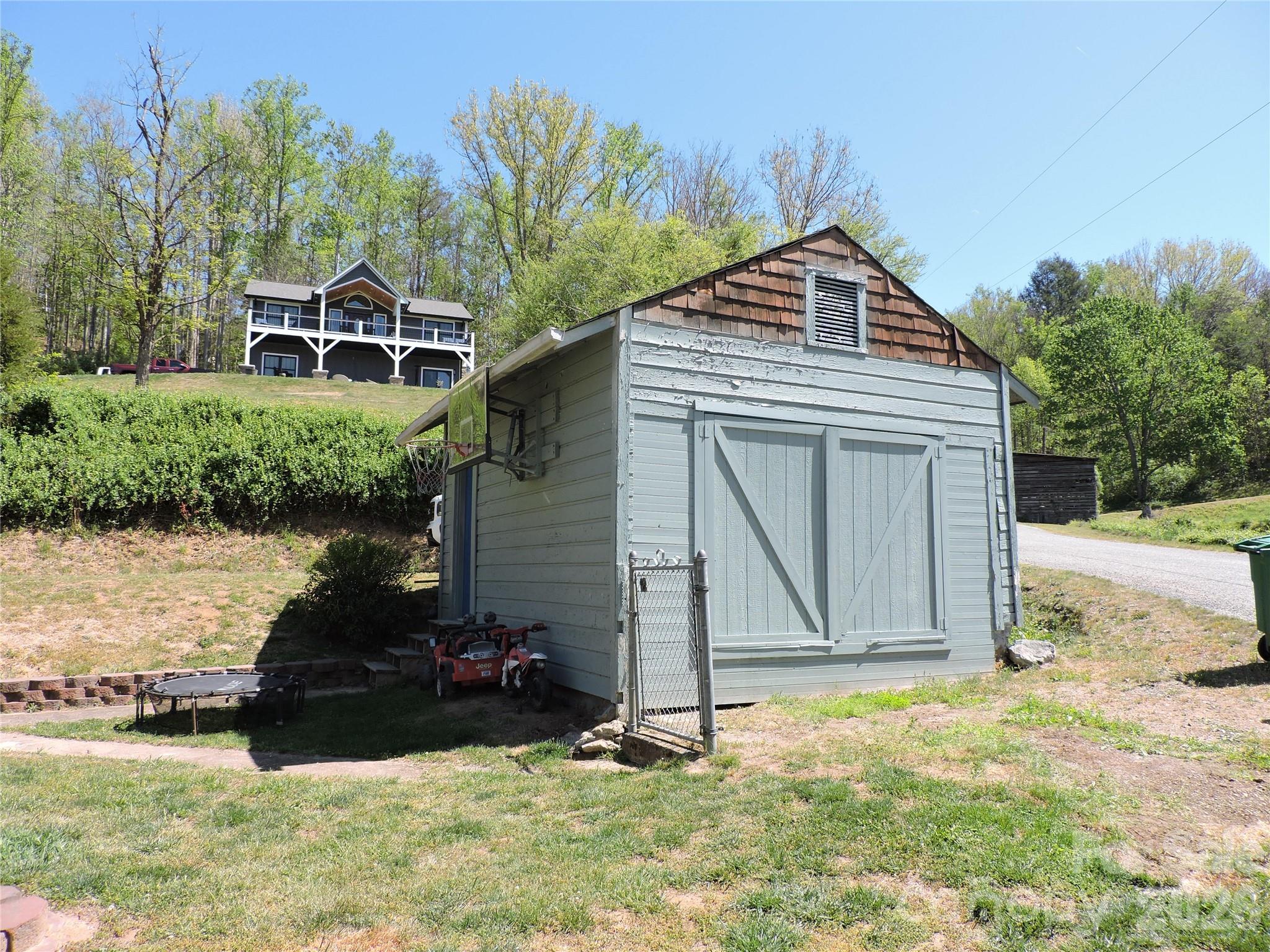 4 Carter Road Weaverville, NC 28787 - Photo 38 of 44 a front view of a house with a yard