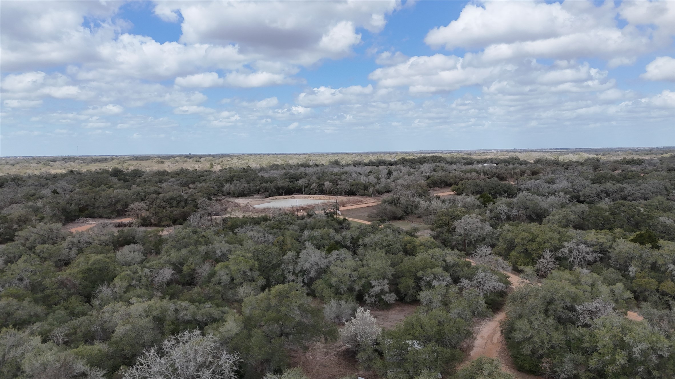 19.88-acres Friar Road Cuero, TX 77954 - Photo 14 of 19 an aerial view of multiple house