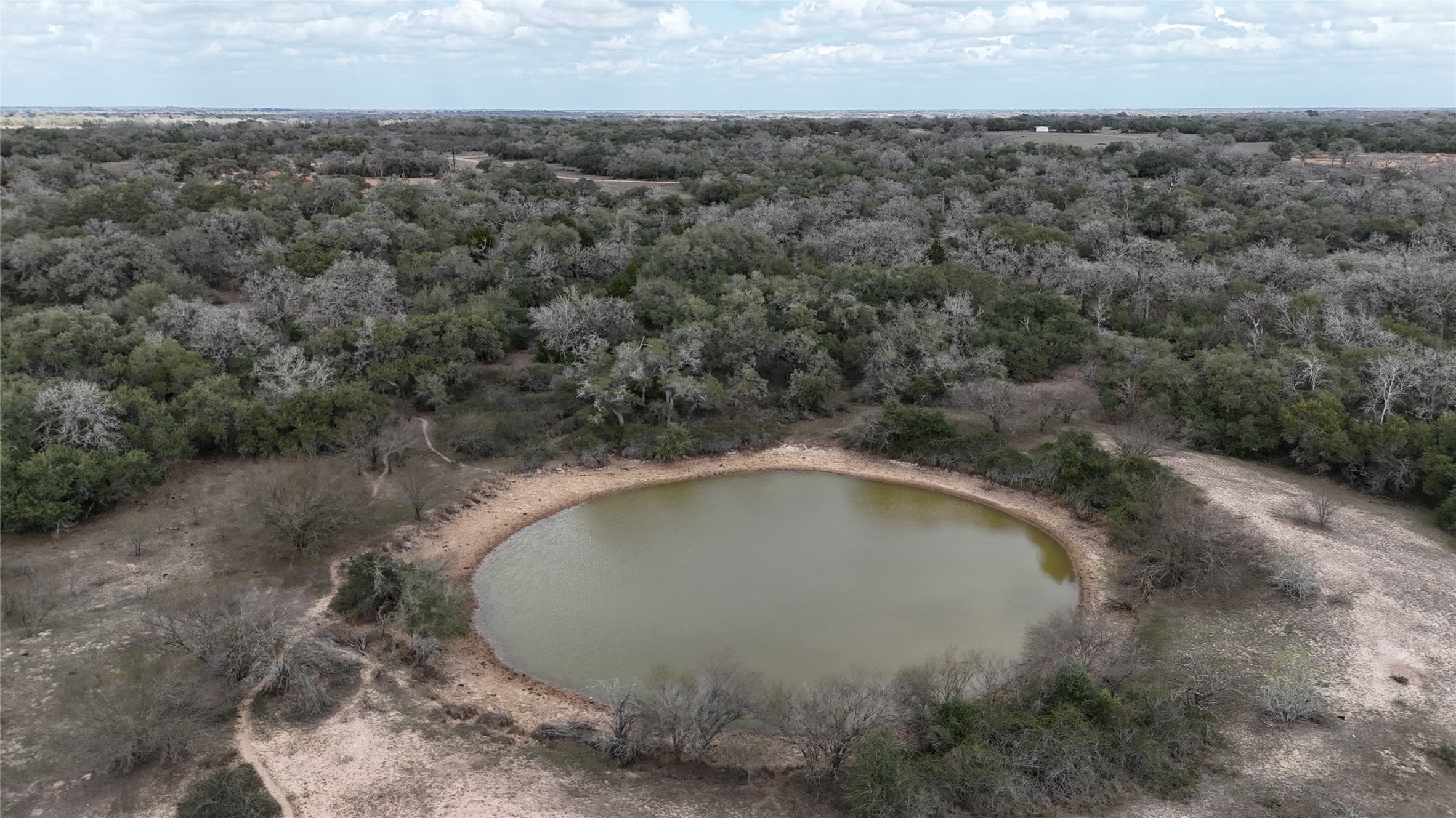 19.88-acres Friar Road Cuero, TX 77954 - Photo 17 of 19 an aerial view of a house with a yard