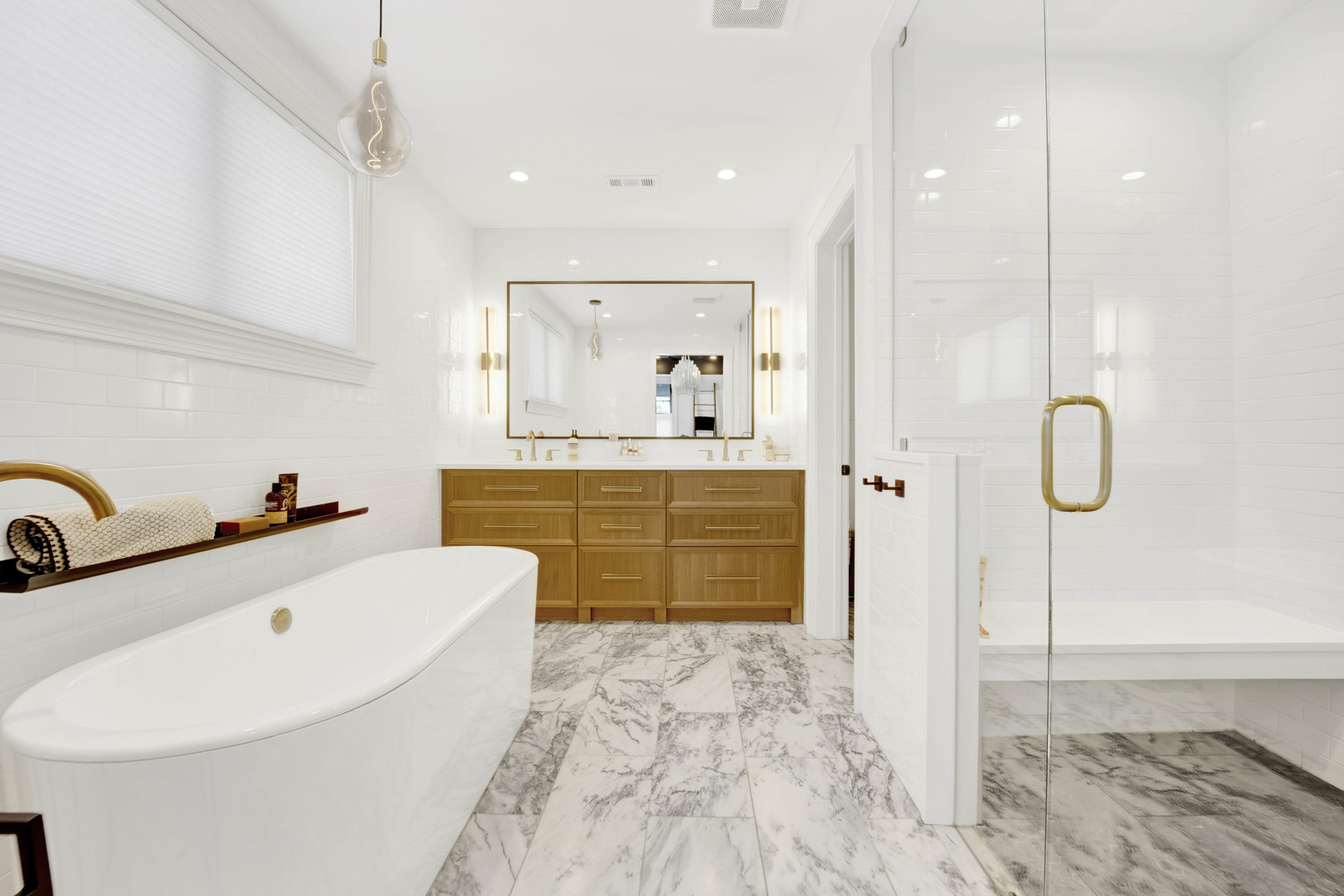 168 Lawton Road Riverside, IL 60546 - Photo 14 of 21 a bathroom with a tub sink and mirror