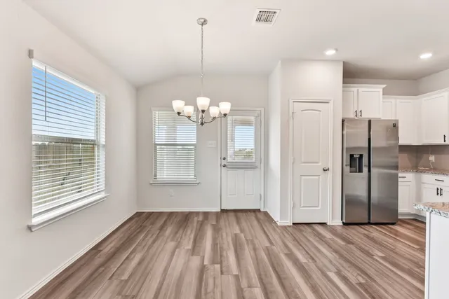 a view of a livingroom with a chandelier