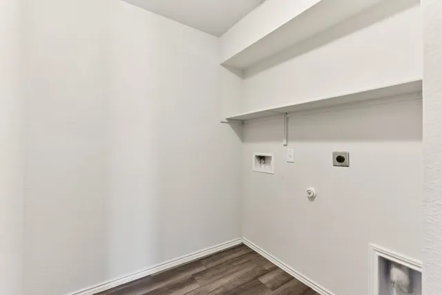 a view of small space with wooden floor