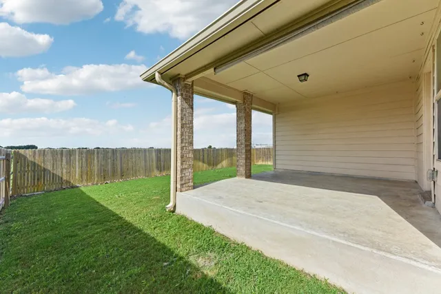a view of a backyard with a garden