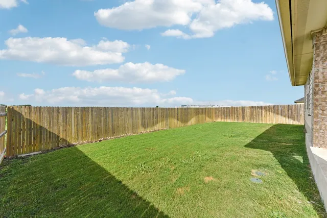 a view of a lake with a big yard