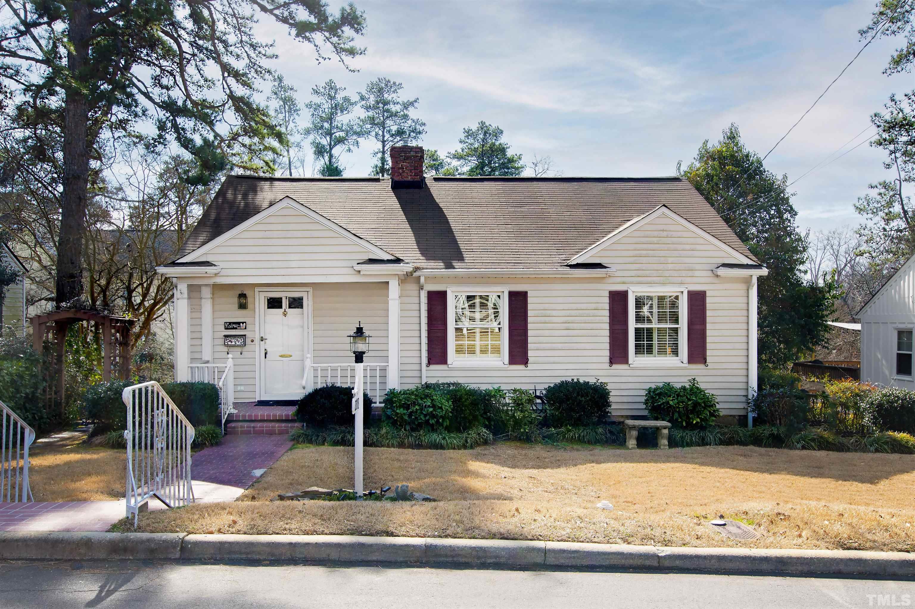 2713 Gordon Street Raleigh, NC 27608 - Photo 1 of 35 a front view of a house with a yard