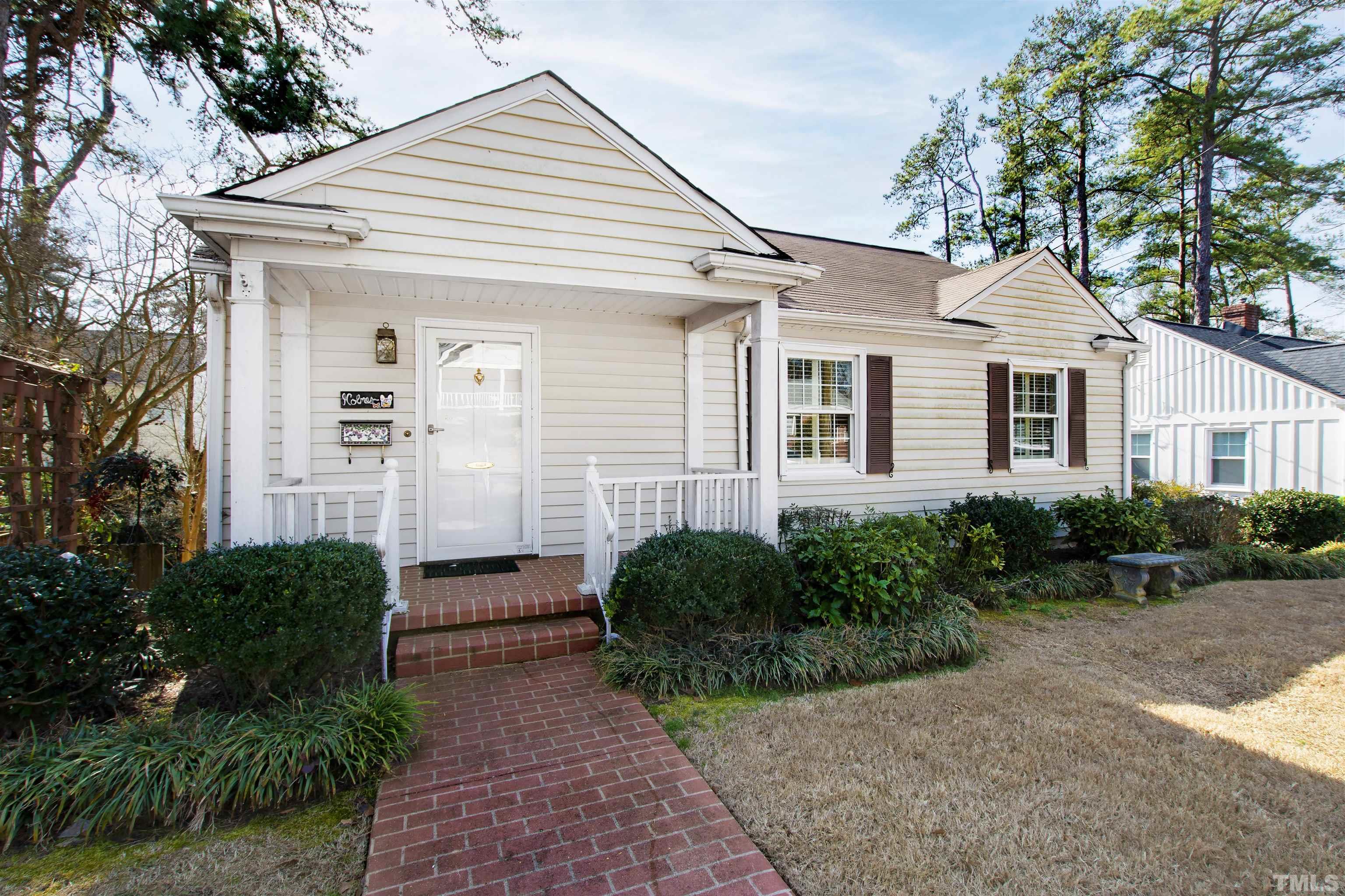 2713 Gordon Street Raleigh, NC 27608 - Photo 2 of 35 a front view of a house with a yard