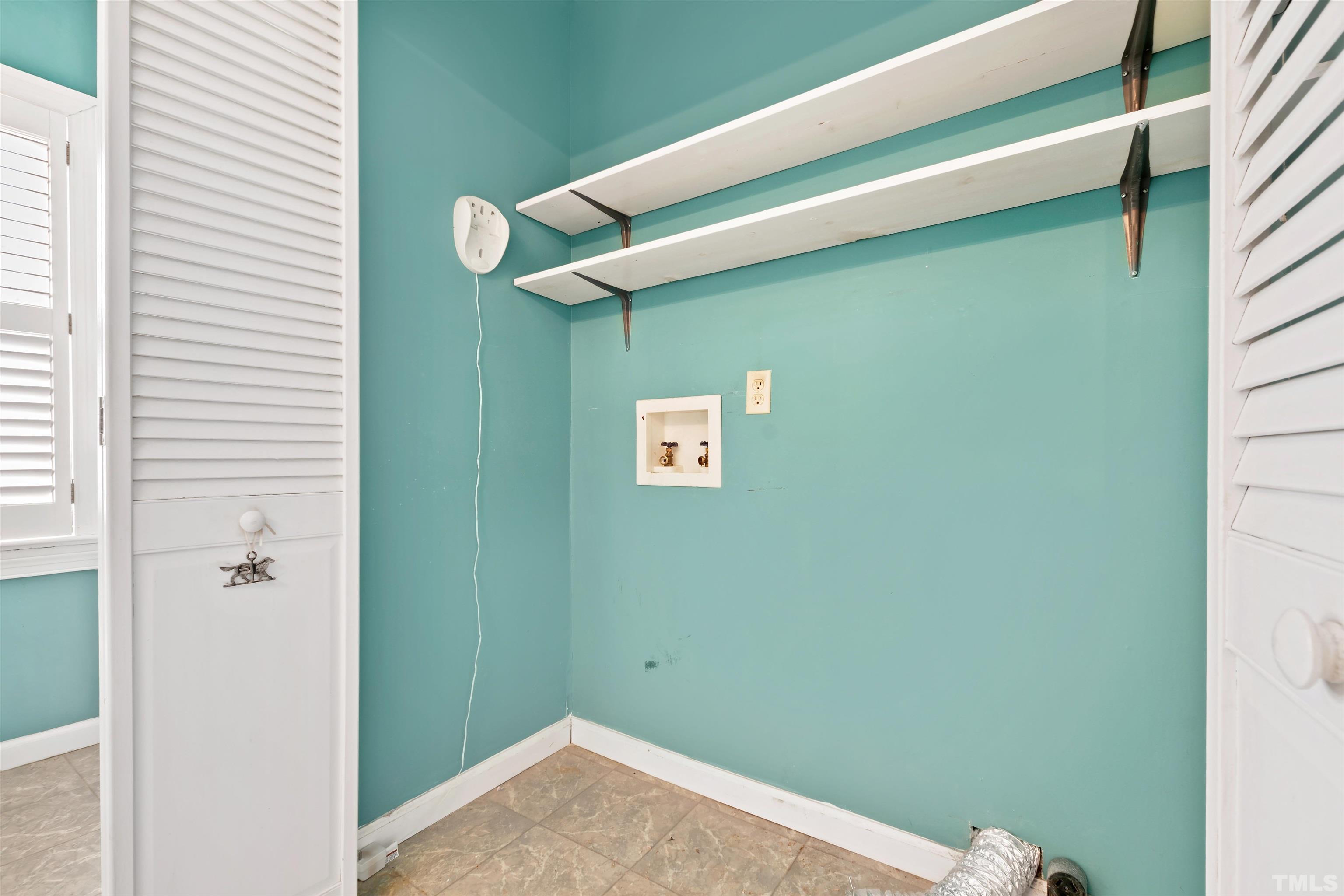 2713 Gordon Street Raleigh, NC 27608 - Photo 22 of 35 a view of a hallway