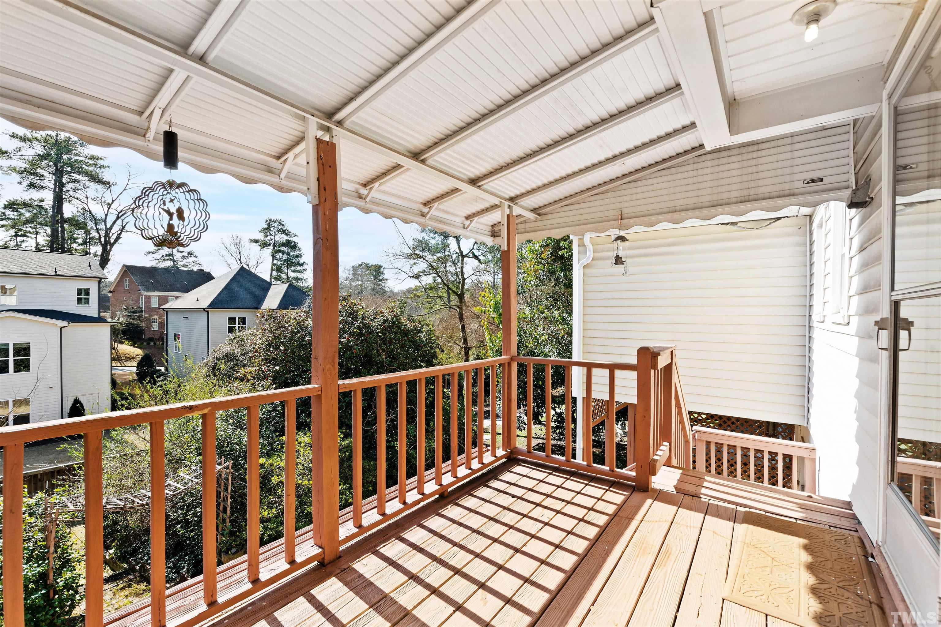 2713 Gordon Street Raleigh, NC 27608 - Photo 32 of 35 a view of a balcony with wooden floor