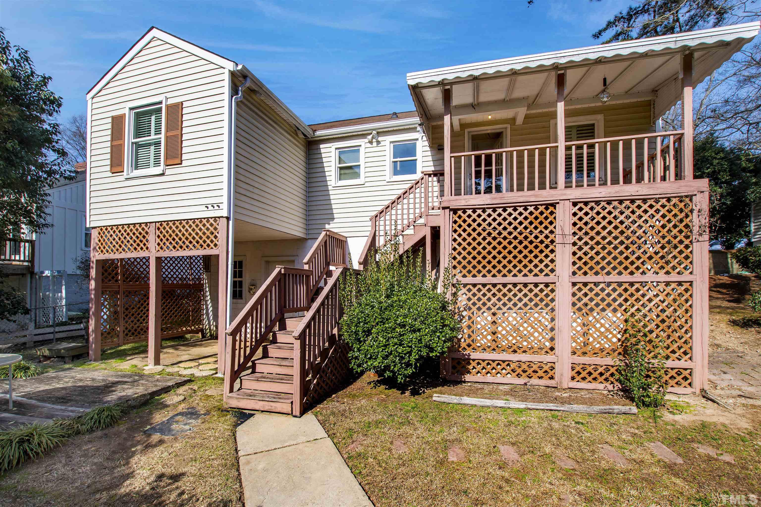 2713 Gordon Street Raleigh, NC 27608 - Photo 34 of 35 a view of a house with wooden fence
