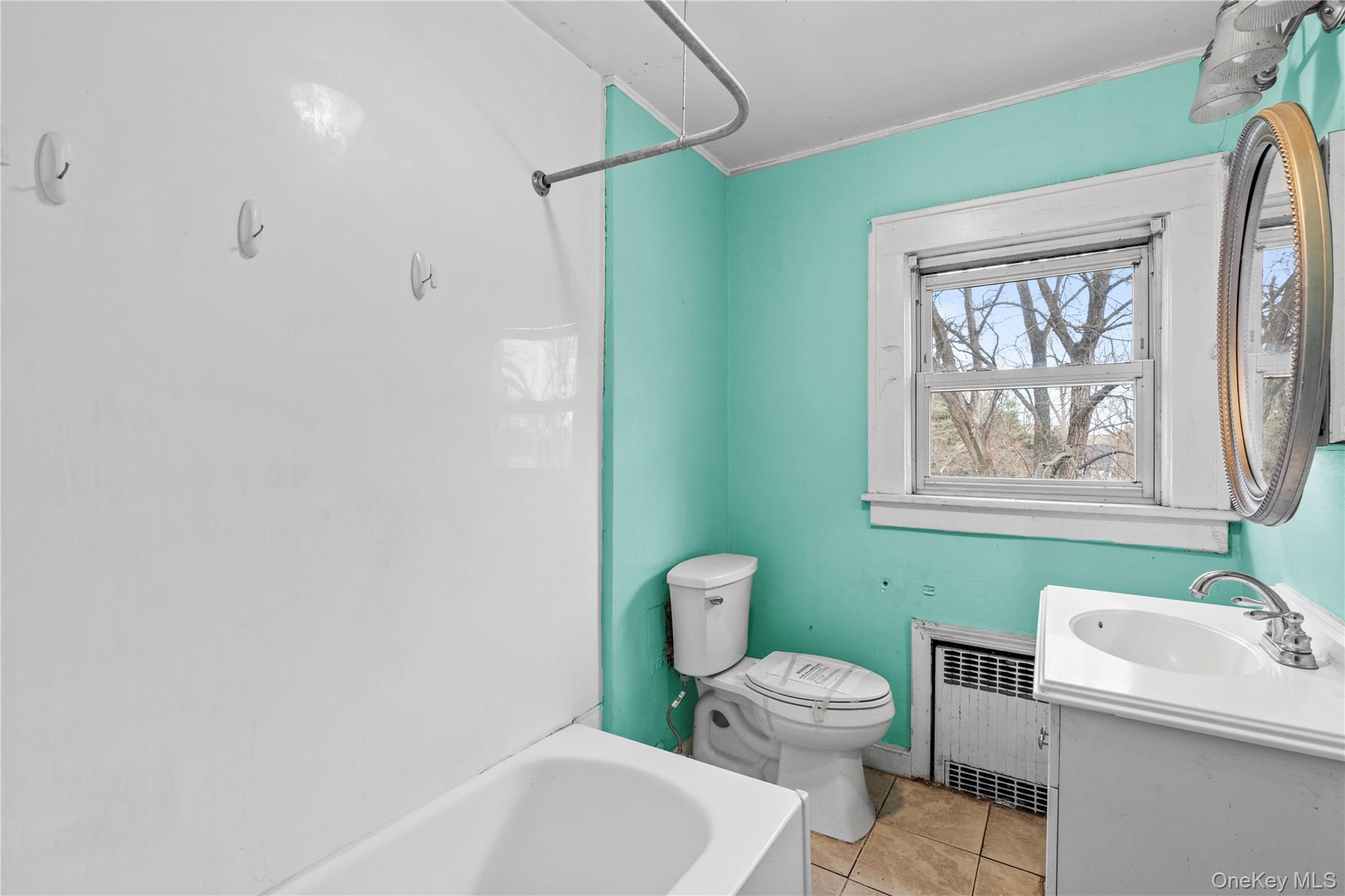 21 Stephens Lane Tappan, NY 10983 - Photo 22 of 30 a bathroom with a toilet sink and mirror