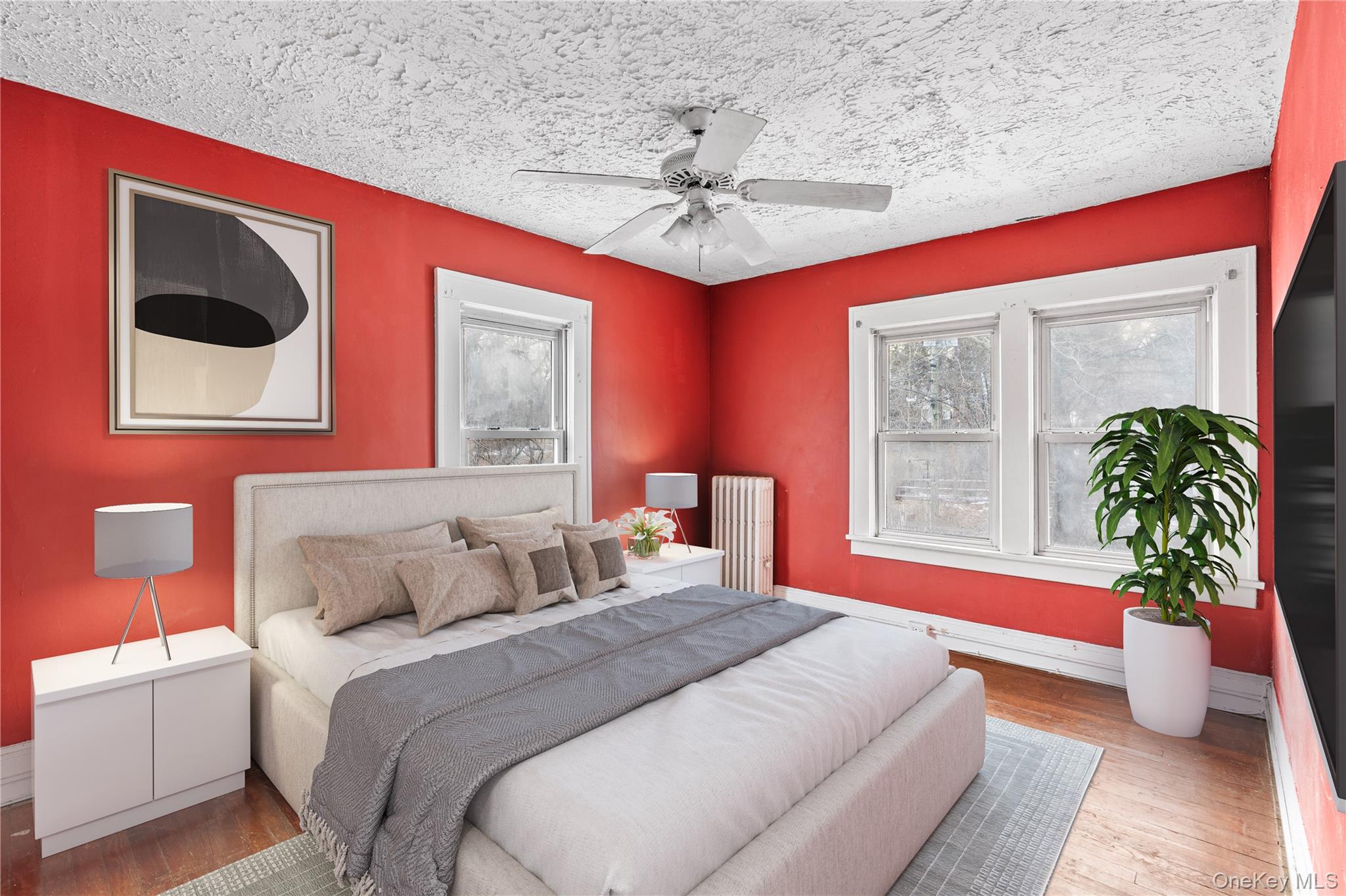 21 Stephens Lane Tappan, NY 10983 - Photo 5 of 30 a bedroom with a bed and a potted plant