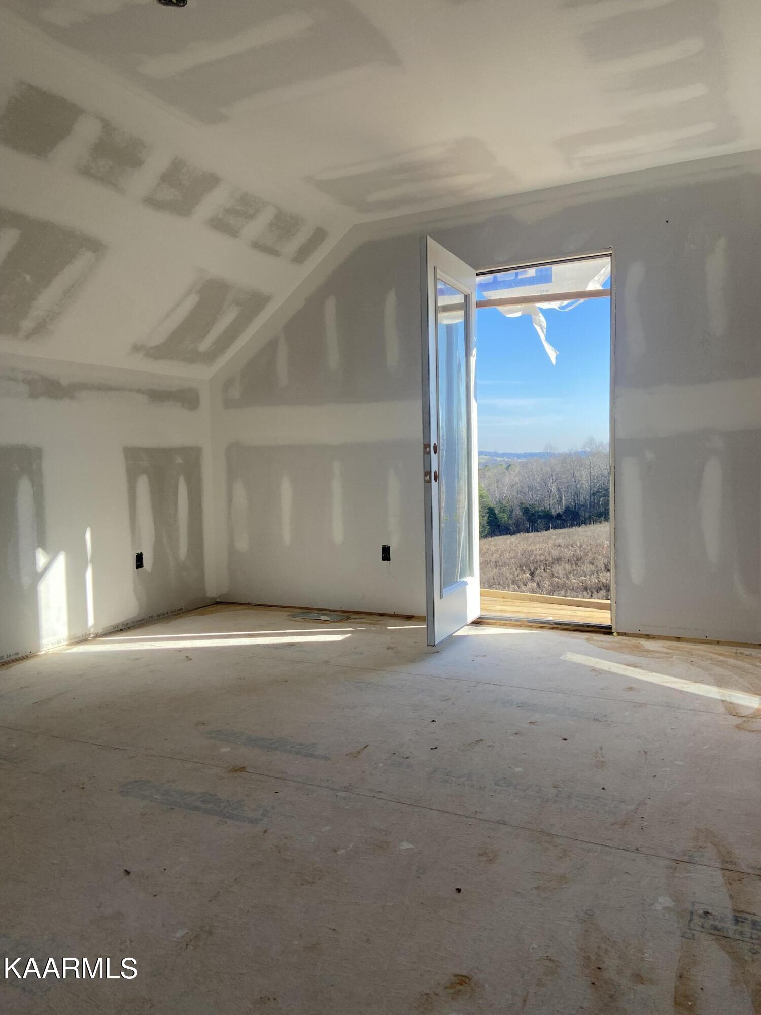 970 Douglas Dam Road, Unit 4 Kodak, TN 37764 - Photo 13 of 27 Top floor bedroom
