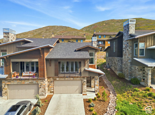 369 East Overlook Loop Kamas, UT 84036 - Photo 5 of 64 Stone veneer and wood siding exterior with multiple balconies