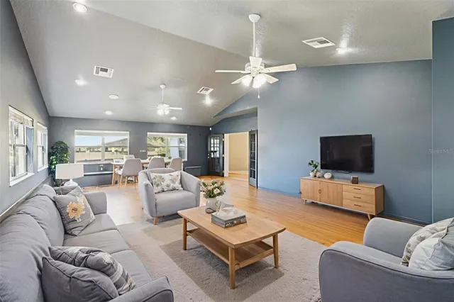a kitchen with appliances cabinets and a sink