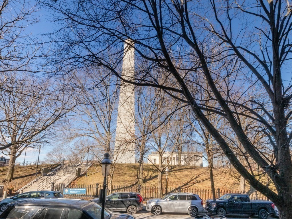 9 Monument Square, Unit 1 Boston, MA 02129 - Photo 15 of 15 a view of street with large trees