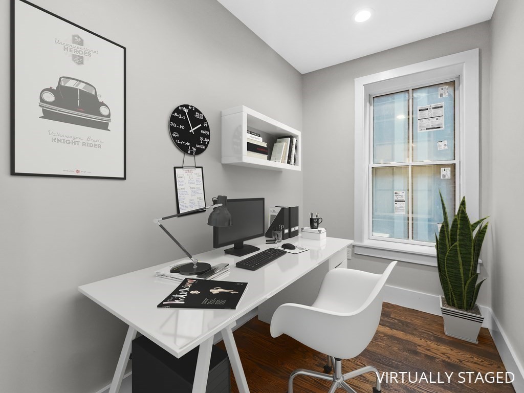 9 Monument Square, Unit 1 Boston, MA 02129 - Photo 7 of 15 a view of a workspace with furniture and a potted plant