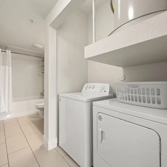 810 West St Johns Avenue, Unit 3203 Austin, TX 78752 - Photo 12 of 20 a utility room with dryer and washer