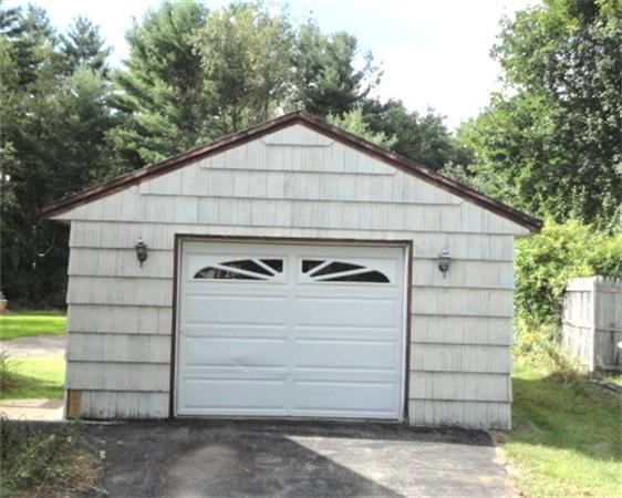 744 Wheelwright Road Barre, MA 01005 - Photo 2 of 10 a view of a small house with a garage