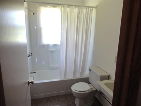 744 Wheelwright Road Barre, MA 01005 - Photo 7 of 10 a bathroom with a sink toilet and shower