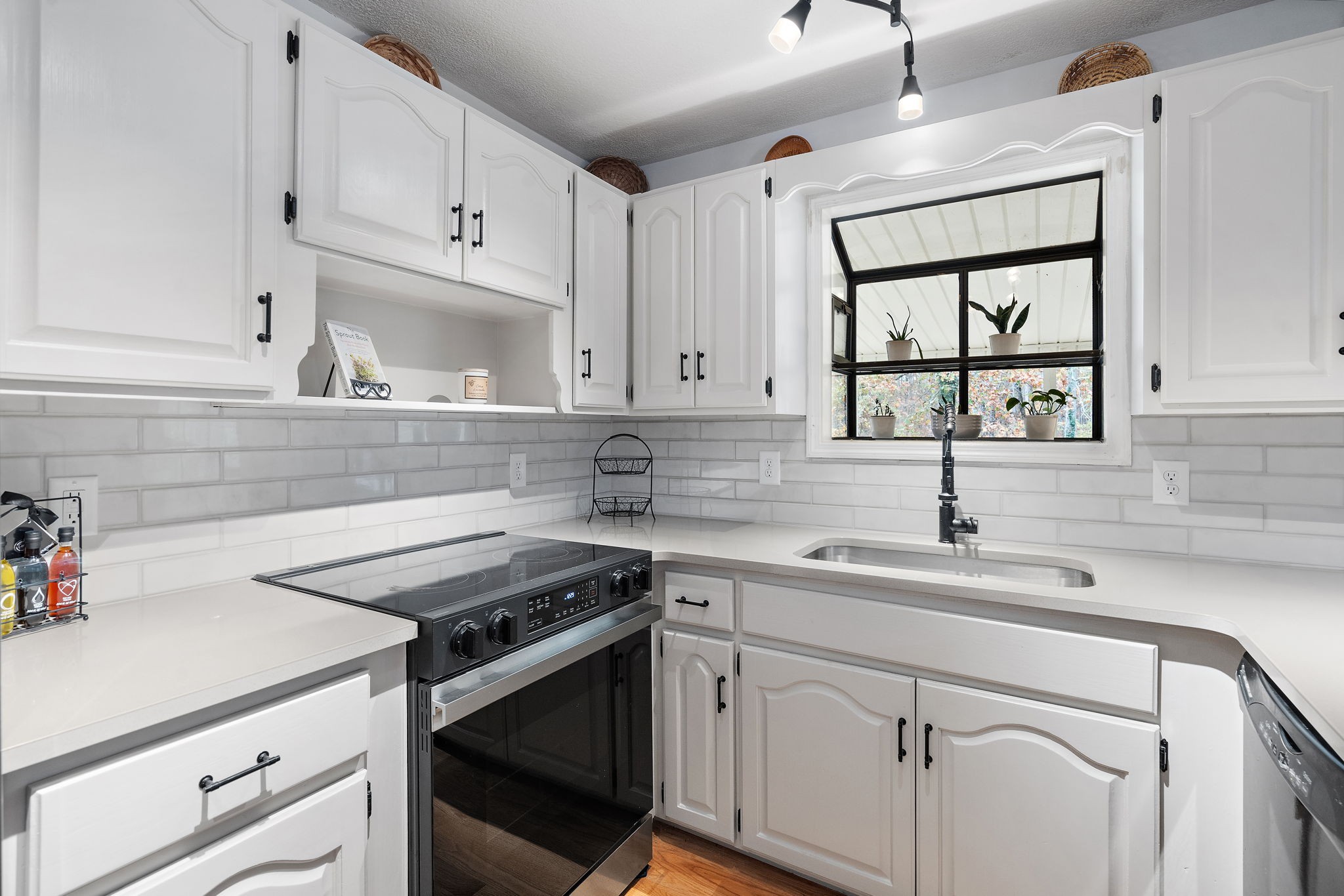 131 Locker Road Summertown, TN 38483 - Photo 11 of 38 a kitchen with appliances cabinets and a sink