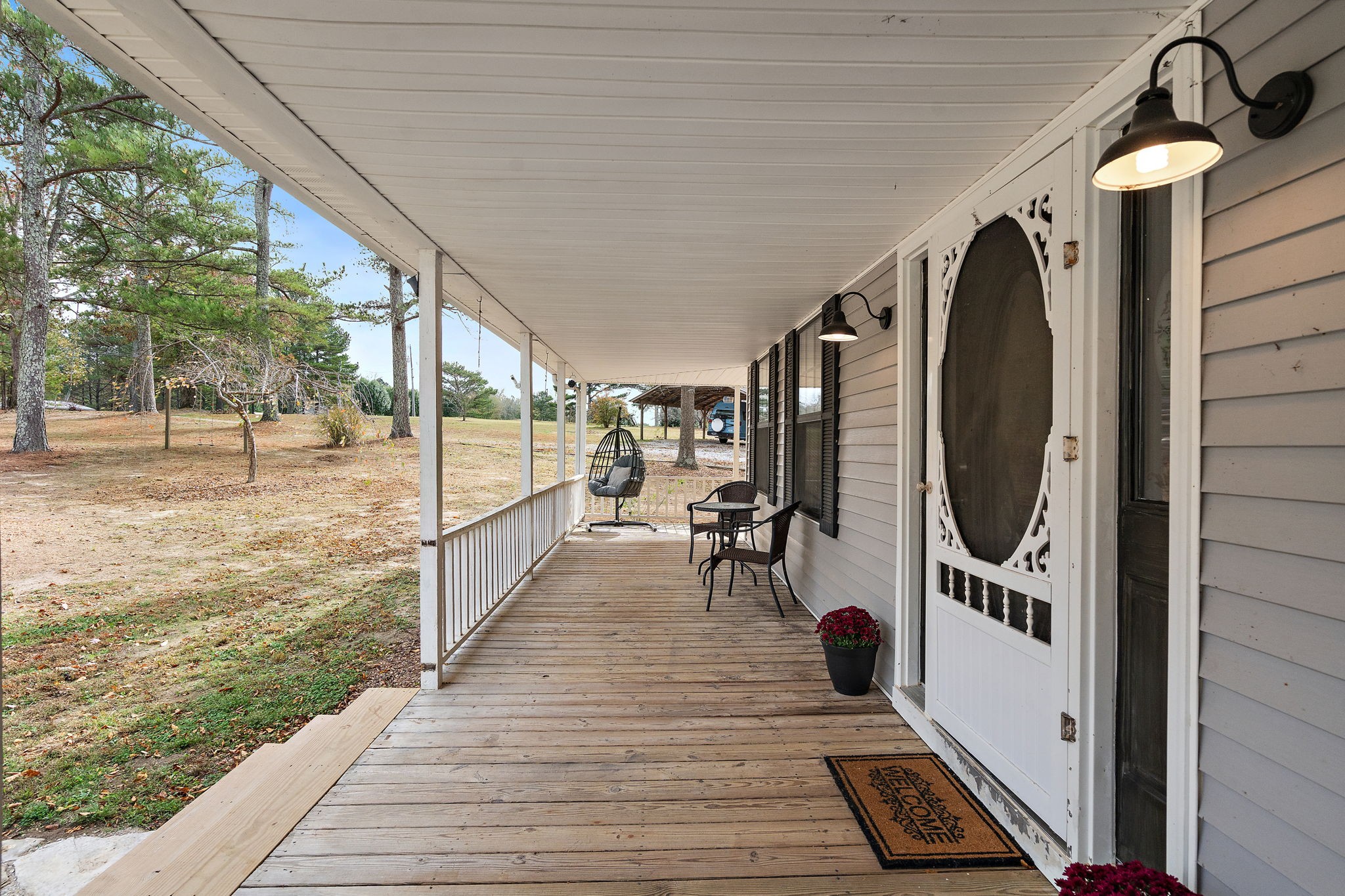 131 Locker Road Summertown, TN 38483 - Photo 2 of 38 a view of a porch with wooden floor