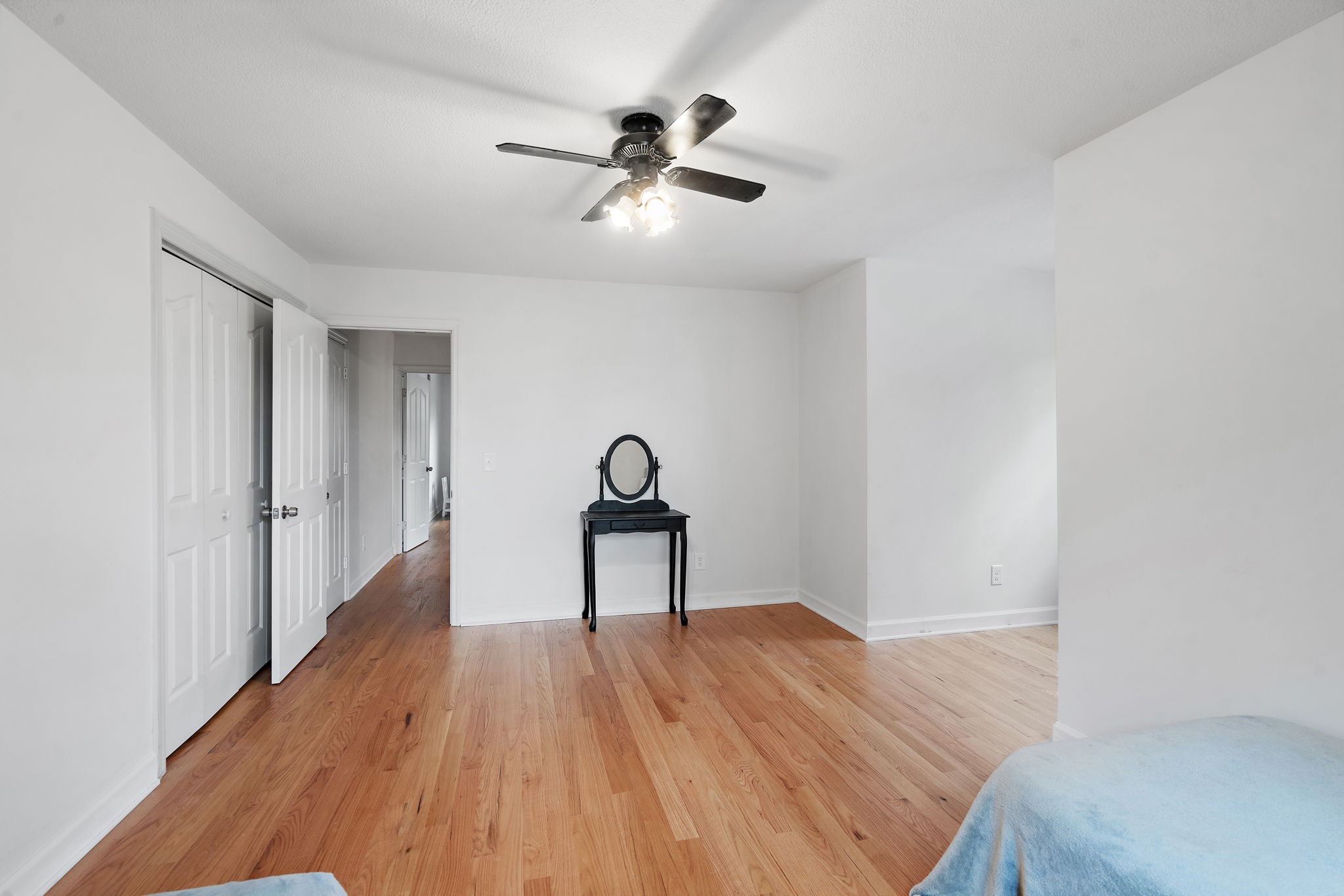131 Locker Road Summertown, TN 38483 - Photo 23 of 38 a bedroom with a bed and a chandelier