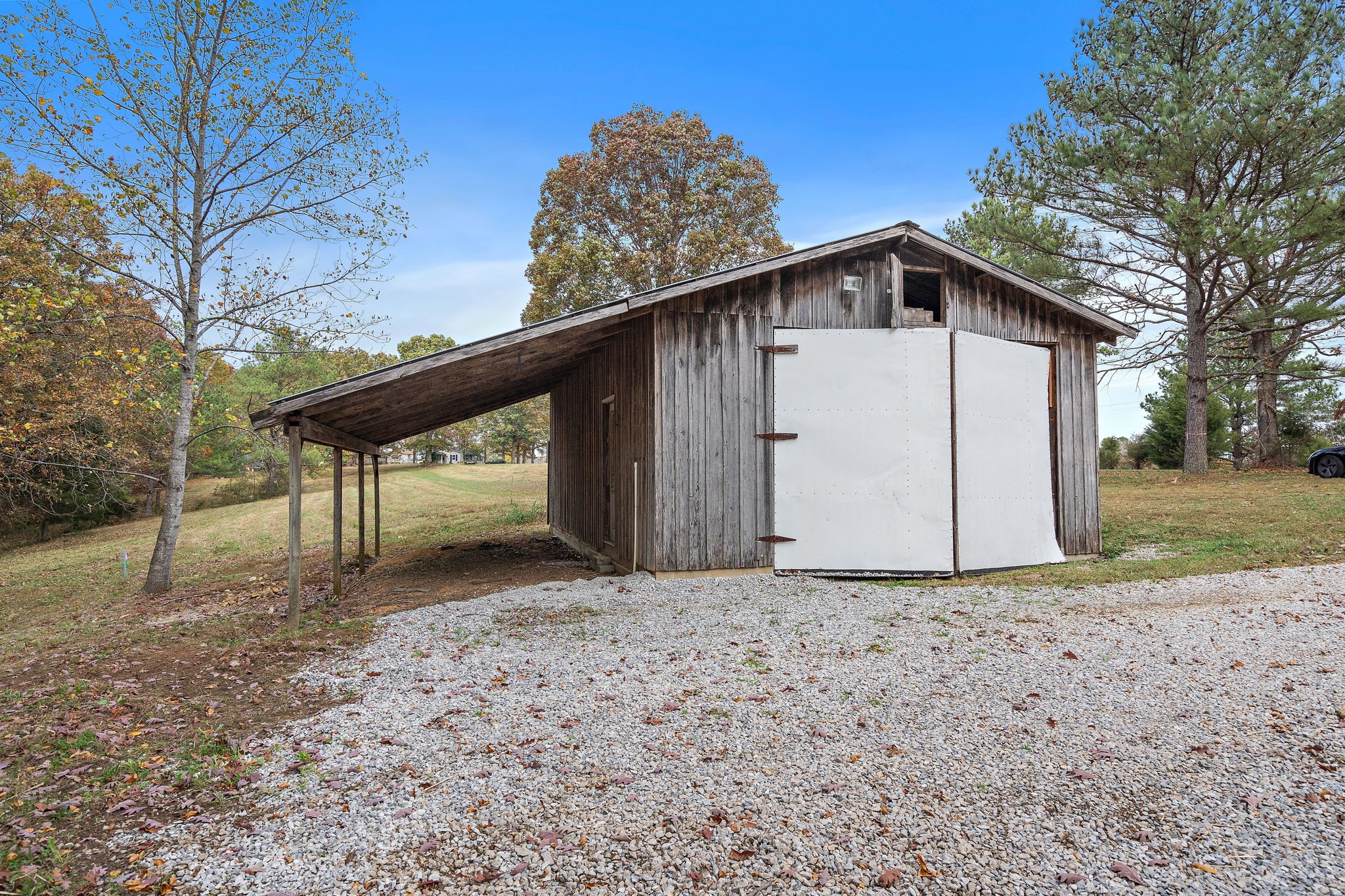 131 Locker Road Summertown, TN 38483 - Photo 30 of 38 a view of a house with a yard