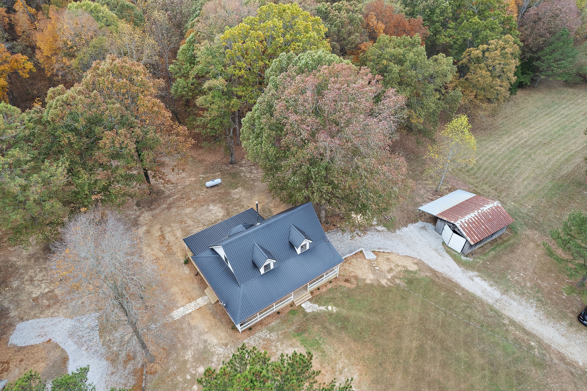 131 Locker Road Summertown, TN 38483 - Photo 32 of 38 an aerial view of a house with a yard
