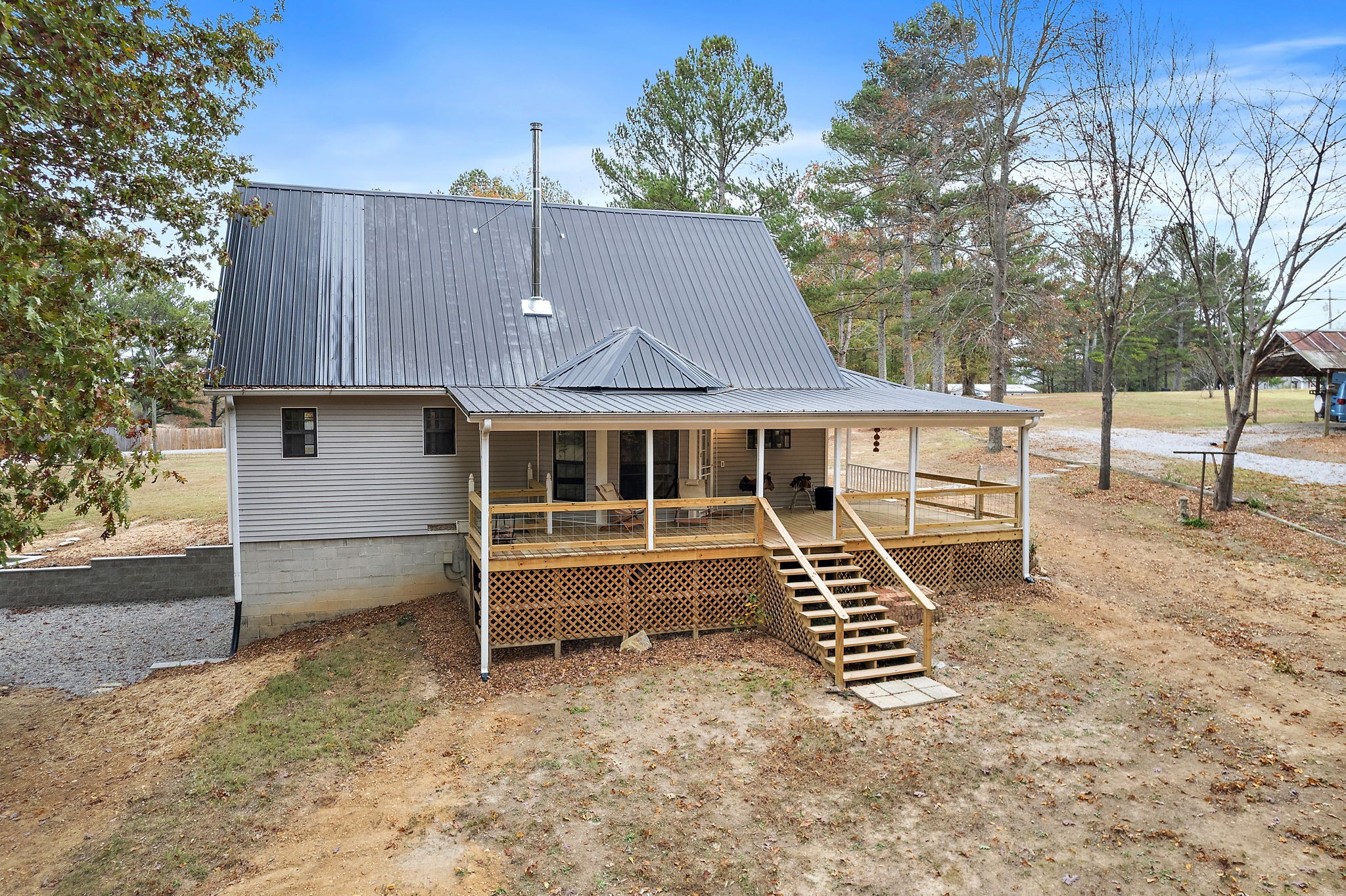 131 Locker Road Summertown, TN 38483 - Photo 33 of 38 a front view of a house with a yard
